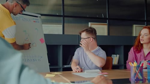 Team Discussing Business Strategy in Modern Office