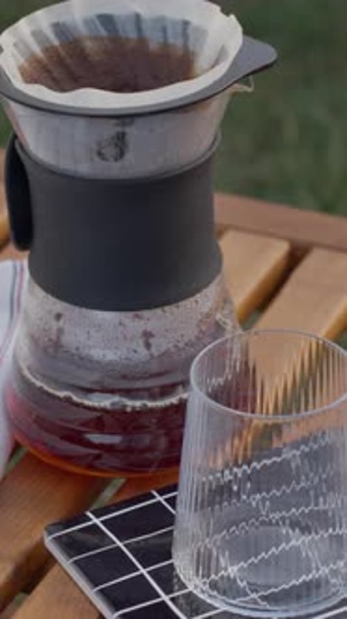 Pour Over Coffee Brewing into Glass Carafe