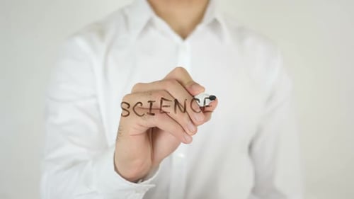 Man Writes Science on Clear Surface