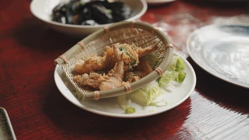 Brightly coloured Asian deep-fried delicacies