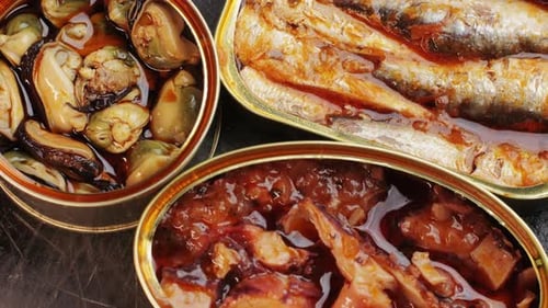 Overhead Close Up of Canned Seafood Trio