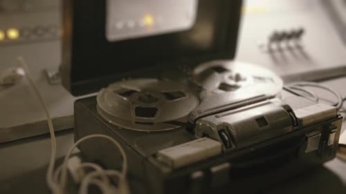 Vintage Reel-to-Reel Tape Recorder in Studio Setting
