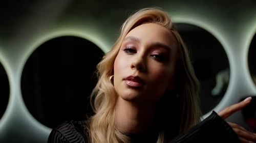 Model in a Makeup Studio with Elegant Makeup and Ambient Lighting Model's Elegant Makeup in Studio