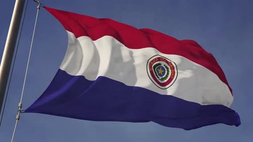 Paraguay National Flag Waving in Wind Against Sky