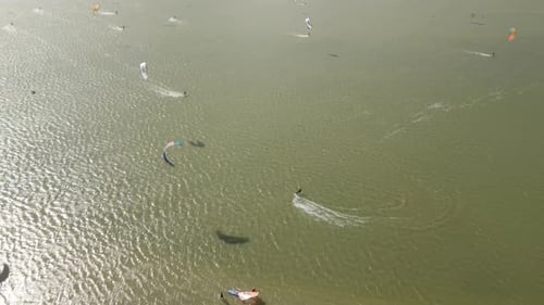 Aerial view of kitesurfing extreme sport with the wind at lake, Netherlands