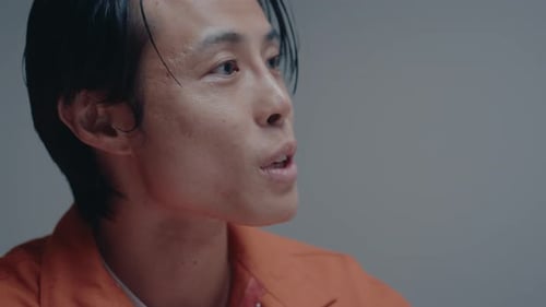 Sly Asian Gangster Being Interrogated