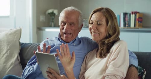 Cinematic shot of happy smiling modern mature senior couple is having fun to make selfie or techno