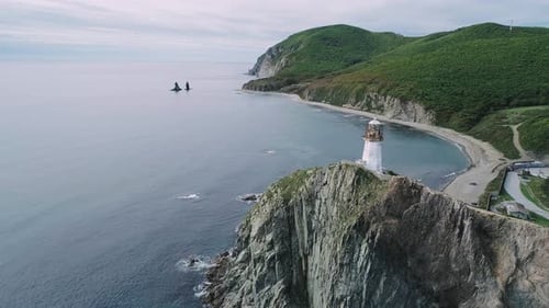 Aerial View of an Old Lighthouse on the Cliff on Pacific Coast Beautiful Panoramic Seascape