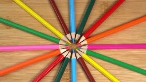 Colorful Pencils Arranged in Concentric Star Pattern