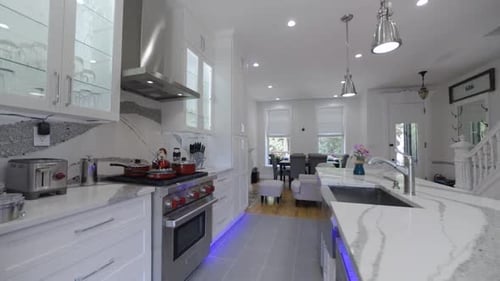 Luxury white designer kitchen, elegant marble countertop with grey markings, interior home