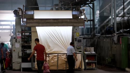 Human Labor Managing Textile Production Line