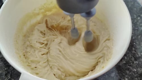 Batter Being Mixed in Bowl with Electric Mixer