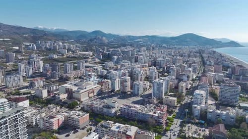 Aerial Video Aerial Perspective of a Coastal City with Panoramic Views of the Sea