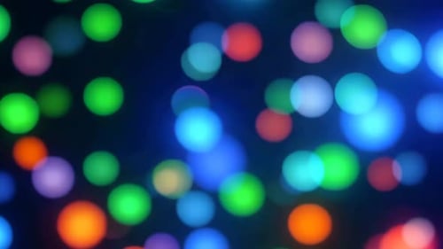 Fond bokeh coloré abstrait avec des lumières chatoyantes