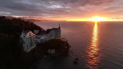 Tsikhisdziri, Georgia - January 2 2025: Aerial view of Castello Mare Hotel at sunset