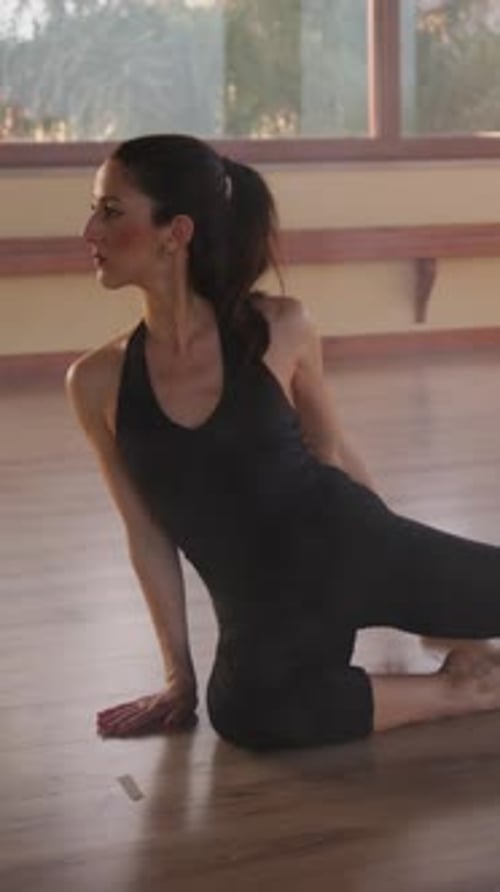 Dancer On The Floor Of The Gym Training
