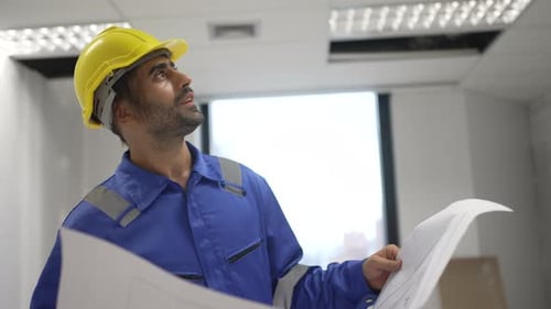Engineer is working at tower.