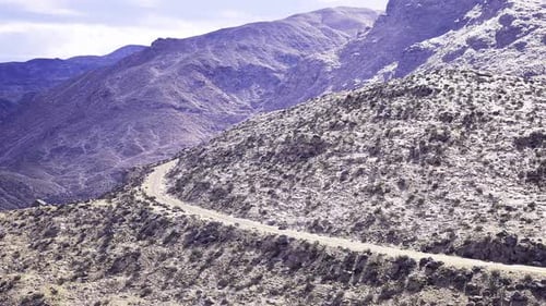 Winding Road in Rocky Mountains Landscape Stock Footage