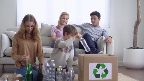 Family Sorting Recycling at Home