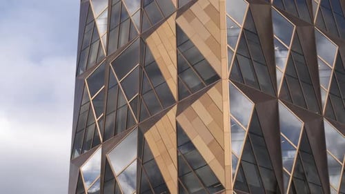Flight Near Unusual Shaped High Business Center of a Central City District Stock Footage Bronze