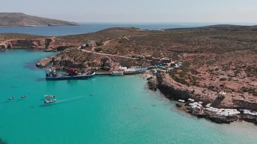 Drone flying over Blue Lagoon Malta, Gozo, Comino