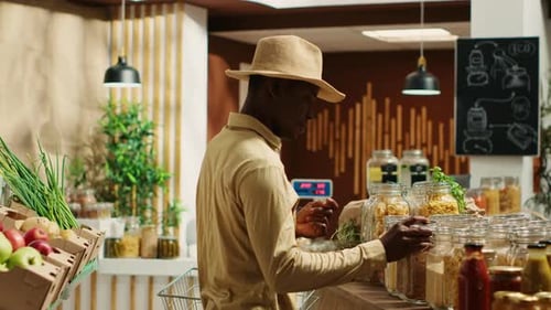 Client Examines Cereals and Grains at Zero Waste Eco Store