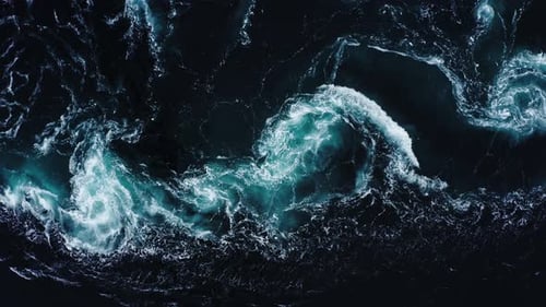 Waves of Water of the River and the Sea Meet Each Other During High Tide and Low Tide