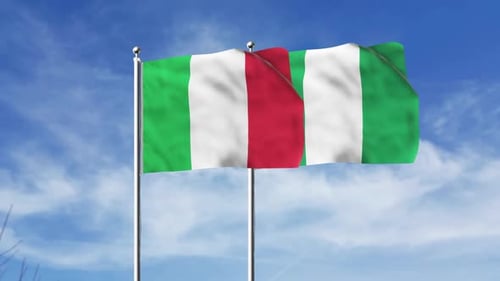 Waving Flags of Nigeria and Italy Against Blue Sky