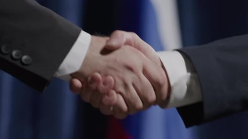 Businessmen Shake Hands on a Deal