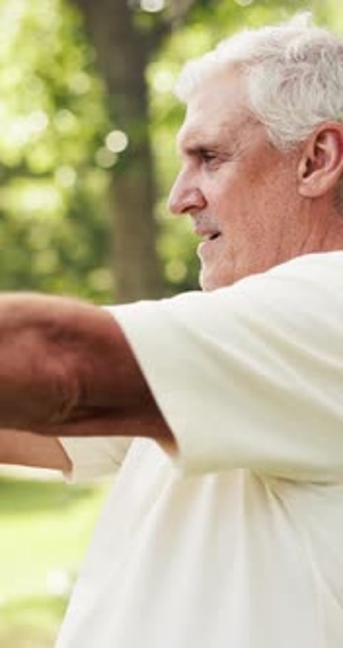 Senior man, weightlifting or exercise with dumbbells for arm movement or strength training in park