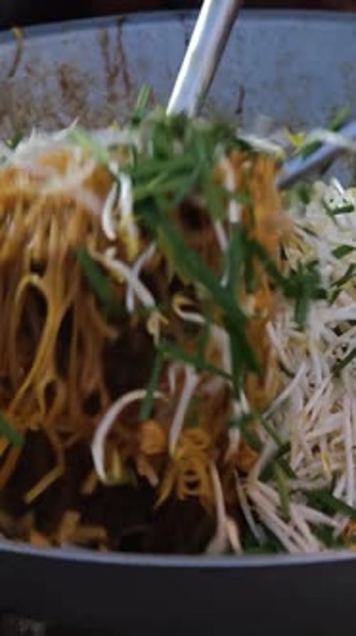 Cooking Noodles and Vegetables in a Pan