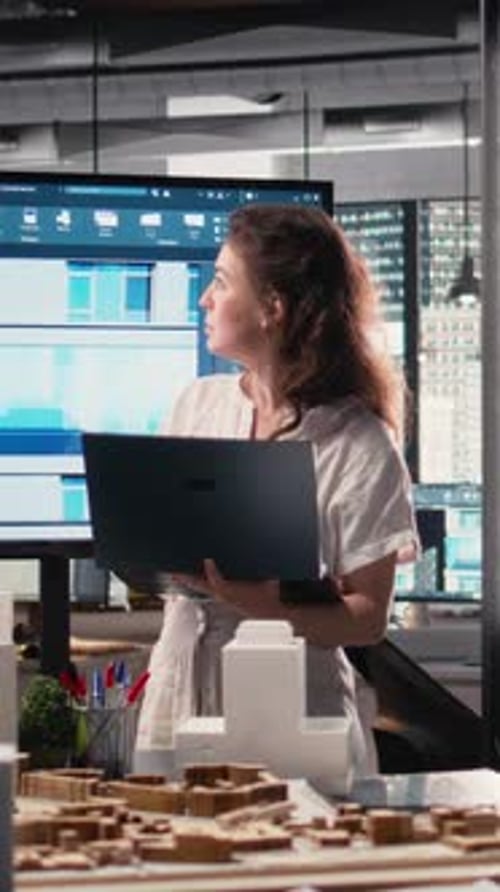 Vertical Video Woman Real Estate Developer Works with 3D Tools and Digital Blueprints