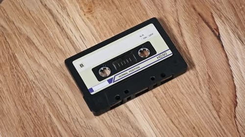 Zoom in on Cassette Tape on Wood Background