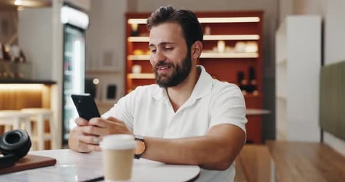 Phone, smile and relax with man in cafe for networking, social media post and lunch break