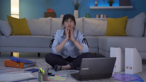 Home office worker woman looking annoyed at camera.