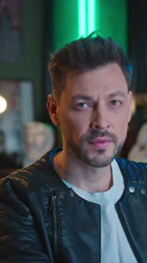 Horizontal Footage of Handsome Young Tired Caucasian Man Working at Computer in Evening Guy in