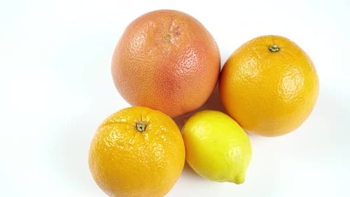 Close Up of Grapefruit, Oranges, and Lemon