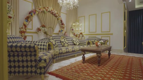 Luxurious interior design featuring an ornate seating sofa arrangement at a lavish banquet centre, a
