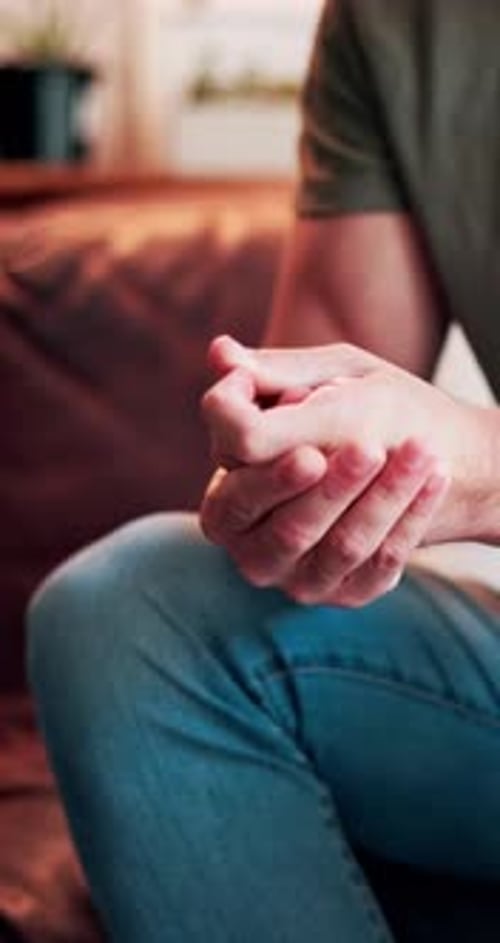 Nervous, hands and man in therapy with anxiety, stress or mental health challenge for addiction