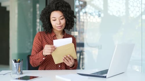 Excited Woman Receives Good News at Work