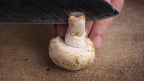 Mushroom Sliced on Wooden Cutting Board Close-up