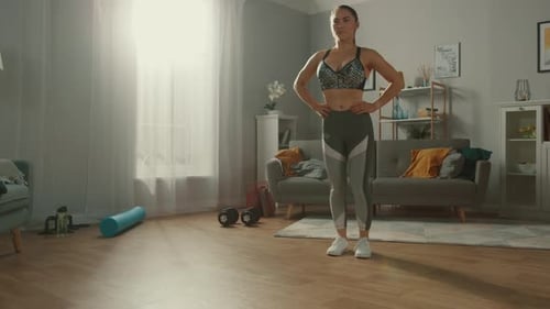 Strong and Confident Athletic Fitness Girl in Sportswear is Doing Forward Lunge Exercises in Her Su