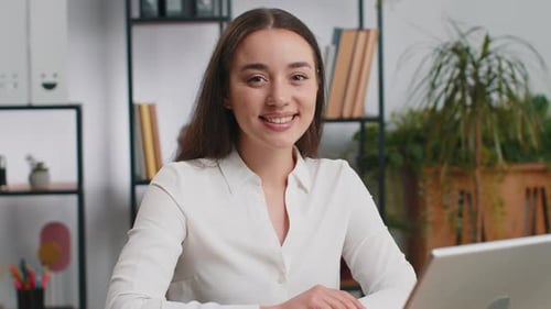 Portrait of Happy Smiling Brunette Caucasian Business Woman at Office Look Away Turn Head at Camera