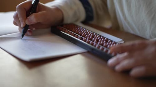 woman using abacus