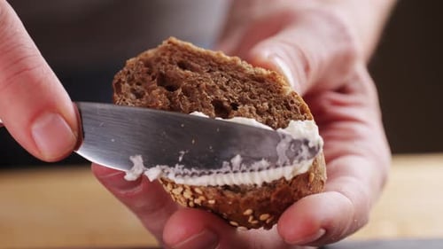 Cream Cheese Spread on Brown Seeded Bread Macro
