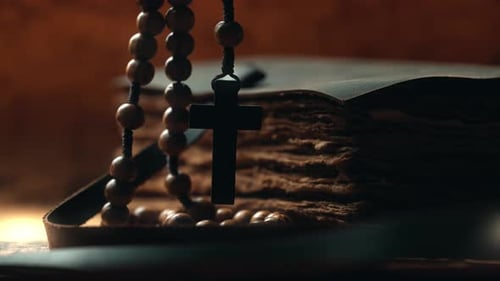 Holy Bible and Wooden Cross on the Desk Spirituality Religion and Hope Concept Symbol of