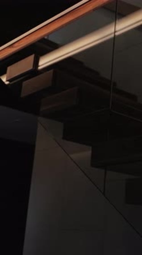Closeup of Wooden Stairs with lightingContemporary Interior Design Slow Motion