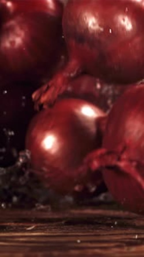Onion Falls on the Table Filmed is Slow Motion 1000 Fps