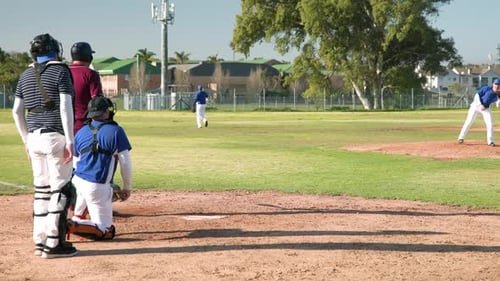 Baseball Players Practice During the Day