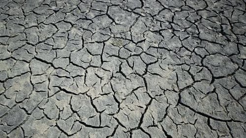 Barren Cracked Earth During Severe Drought Conditions